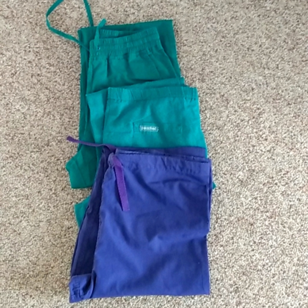 Scrub pants. each. 3 pairs price per pair. 2 Green, 1 purple